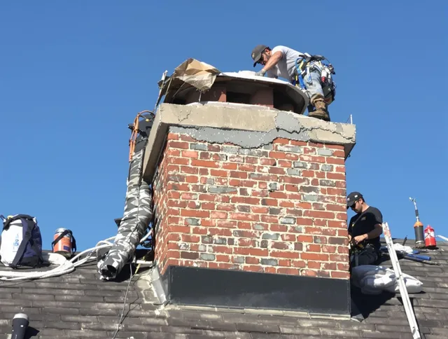 Mahoning Chimney Sweep installing a custom chimney crown in Mahoning, OH