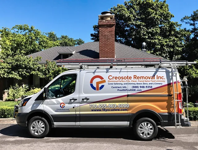 Mahoning Chimney Sweep technician removing creosote safely in Mahoning, OH