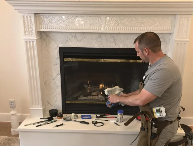 Mahoning Chimney Sweep performing fireplace maintenance in Mahoning, OH