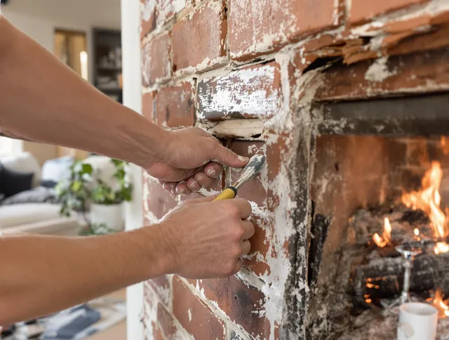 Routine fireplace repair by Mahoning Chimney Sweep in Mahoning, OH